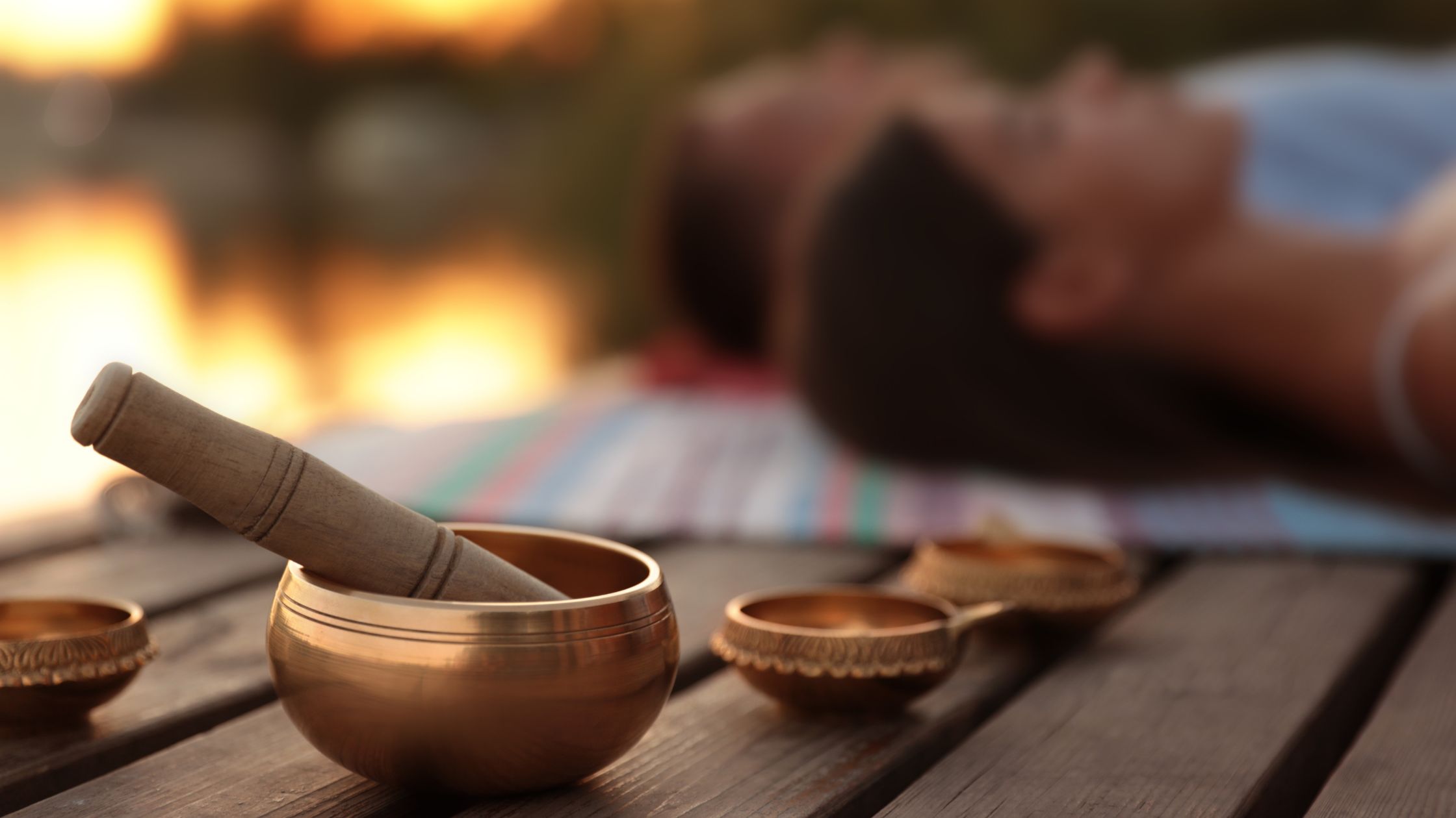 Sound healing session with singing bowls in a serene wellness environment